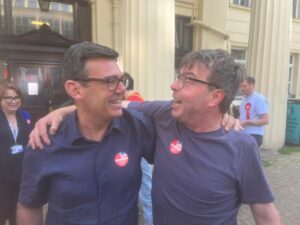 Andy Burnham, Mayor of Manchester with founder of East Brighton Food Co-op, Bryan Coyle