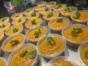 freshly made butternut and sweet potato soup with parsley